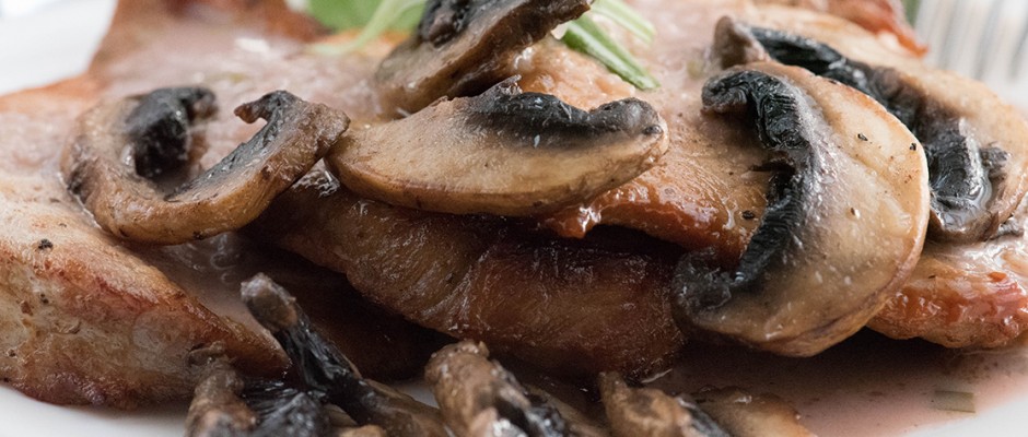 Juicy pork in a creamy cherry sauce