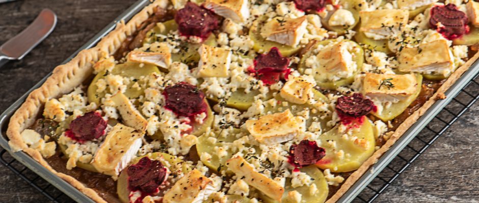 Quiche with red onion and cheese, ingredients:  The quiche layered with red onions chutney. Slightly caramelized and in saturated color, it strongly contrasts with the structure of boiled potatoes and cheeses. Layers merge into one perfect bite. Butter-flavored dough followed by caramelized onions, potato density and the mix of Greek cheese and Brie cheese.  Beetroot in forms of spring flowers creates mood, color, and anticipation for something😊 special.  Preparation:  You can prepare the chutney and quiche crust in advance and assemble the dish in minutes during the week.  The baked quiche has excellent taste and cold, removed from the refrigerator. The dough retains its crunch and texture. This makes the dish suitable for office or school Lunchbox. How to make it easily:   Start by kneading the dough. While it is cooled in the fridge, boil the potatoes, and prepare the chutney.  That way, in 30 minutes, you’ll be able to prepare everything. The finished dish will be ready in just 60 minutes.  Variations:  Greek cheese is an excellent choice because it complements the taste of onions. But you can use mozzarella or other cheese. You can also replace it with turkey fillet or salami. Brie cheese replace with Cheddar or Yellow Cheese. You can also prepare stuffing with spinach, eggs and ricotta.  Let your imagination guide you and enjoy a nice dinner with your loved ones.