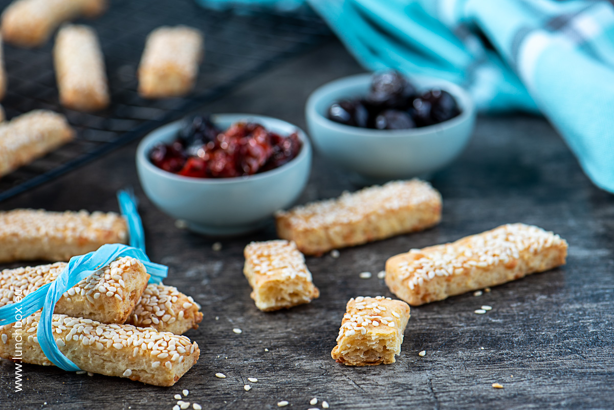 Crackers with cream cheese and parmesan