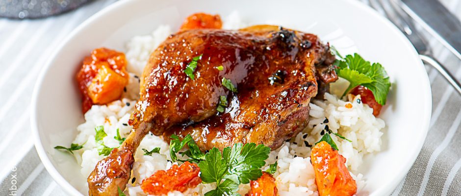 Duck leg with rice and papaya chutney