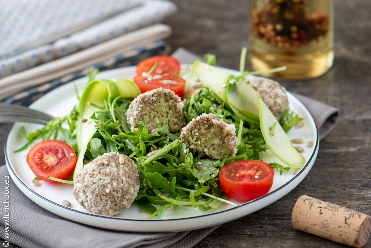 Aragula salad with avocado balls